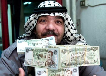 انخفاض قيمة الدينار العراقي