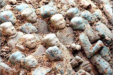 REUTERS/ More than 30 small warrior figures from ancient China's Eastern Han Dynasty (25A.D.-220A.D.) are seen after being unearthed