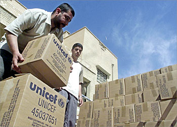 F_Workers at the Baghdad Health Center, unload supplies distributed by the UNICEF 03 May 2003. The protection of children must be the top priority in Iraq because they still face grave threats to their survival despite the end of the war, the UN Children's Fund (UNICEF) said yesterday. AFP PHOTO/Ahmad AL-RUBAYE