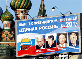 F_A pre-election billboard for the pro-Kremlin 'Unity' party and its candidates, (L-R) Russian Interior Minister Boris Gryzlov, Sergey Shoygu, Yuri Lizhkov and Mintimer Shaimiev stands in Moscow's Red Square, 02 December 2003. 'Unity' is the strongest candidate for Russia's Parliament elections, which take place 07 December. AFP PHOTO / MLADEN ANTONOV