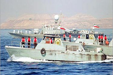 f: File picture dated 29 October 2004 shows Iranian Navy boats taking part in maneuvers in the Strait of Hormuz and the Sea of Oman 29 October 2000. The Iranian navy has seized three British naval boats alleged to have entered its territorial waters on the Iraqi border, detaining eight crew,