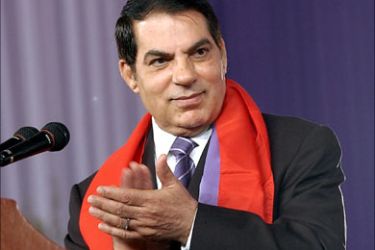 f_Tunisian President Zine El Abidine Ben Ali applauds during