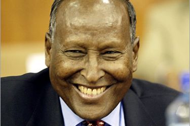 f - Abdullahi Yusuf Ahmed smiles after winning the presidency of Somalia in a vote by lawmakers among 26 candidates