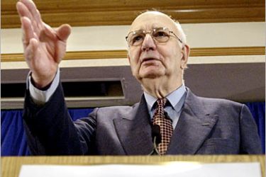 AFP - Paul A. Volcker (R), chair of the Independent Inquiry Committee into the United Nations oil-for-food program in Iraq, speaks at a press conference 29 March, 2005 in New
