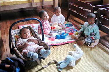 REUTERS /Babies are seen in this undated photo taken at the Akany Avoko orphanage, 12 km (7 miles) outside the Madagascan capital, Antananarivo. Every year, thousands of French