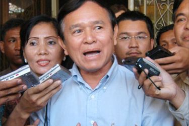 Director of the Cambodian Center for Human Rights Kim Sokha (C) talks to the press before he was arrested at his office in Phnom Penh, 31 December 2005. Although Sokha was arrested for defemation, it was unclear who had filed the defamation charge,