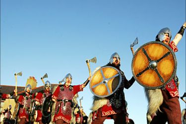 f_Shetlanders dressed as Vikings parade through the streets of Lerwick, on the Shetland Islands north of Scotland