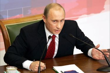 Russian President Vladimir Putin answers questions during his annual press conference in Moscow 31 January 2006. Putin said at his press conference at the Kremlin that Russia regrets a scandal over British spies allegedly operating in Russia but remains confident of strong relations with Britain.