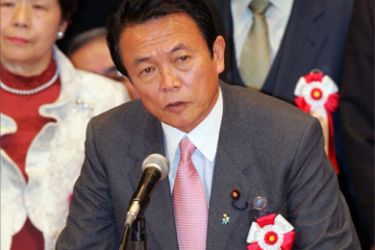 Japan's Foreign Minister Taro Aso speaks at the Northern Territories Day rally calling for the return of four windswept north Pacific islands in Tokyo February 7, 2006