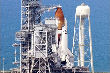 AFP - The space shuttle Discovery sits on launch pad 39B, 01 July, 2006, at the Kennedy Space Center in Florida. NASA scrubbed the launch of Discovery over weather concerns.