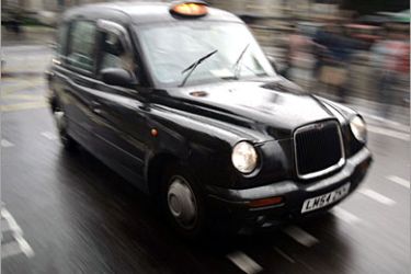 REUTERS /A taxi drives through rush hour traffic in London August 23, 2006. Satellite navigation systems may be the latest "must have" car gadgets but London's cab drivers, who have to