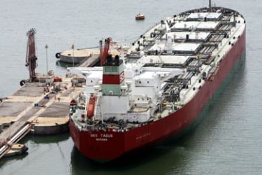A picture taken 13 September 2006 shows an oil tanker supplied with oil at the main oil port in Bijaya City some 210km east of Algiers. The 50 billion dollar 2005 oil revenue