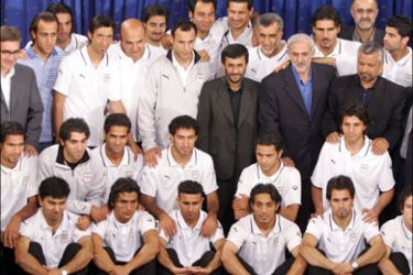 afp - File picture dated 03 June 2006 shows Iranian President Mahmoud Ahmadinejad (C), the former president of Iran's football