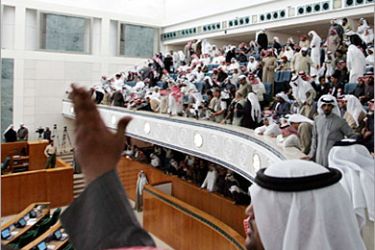 AFP / Kuwaitis protest inside the parliament in Kuwait City 27 November 2006. Hundreds of Kuwaitis protested inside the parliament today demanding that billions of dollars in