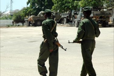 Ethiopian soldiers patrol the streets surrounding the head quarters of the Somali government "Villa Somalia", in this 16 January 2007 pictures from Mogadishu