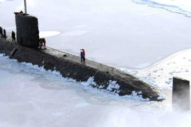 This Ministry of Defence handout picture released 21 March 2007 shows British submarine HMS Tireless surrounded by ice in an unknown location. Two British sailors were killed