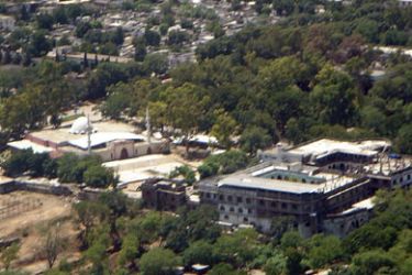 R/ An aerial view is seen of Lal Masjid or Red mosque compound in the centre of a residential area in Islamabad July 8, 2007.