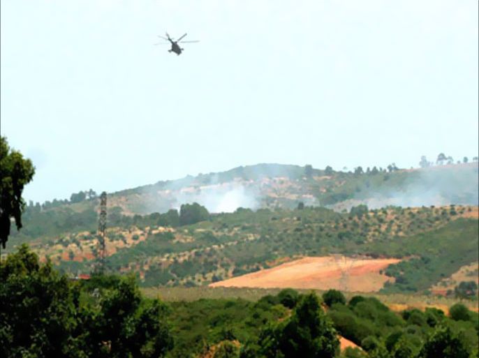 AFP/ Smoke comes from a zone where the army is fighting about 30 armed Islamists, holed up in the mountainous Kabyle zone, east of Algiers 29 August 2007.