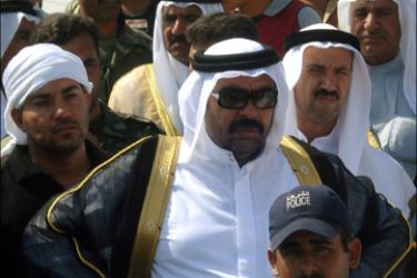 afp : Sheikh Ahmed Abu Risha attends his brother's funeral in Ramadi, 14 September 2007. Sunni Arabs in Iraq's Anbar province vowed to avenge the death of their leader Sheikh