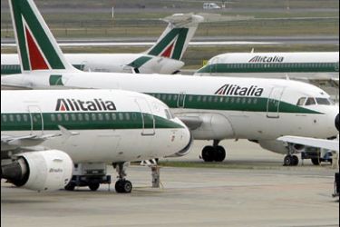 r/Alitalia jets are seen on the tarmac of Malpensa airport in Milan October 22, 2007