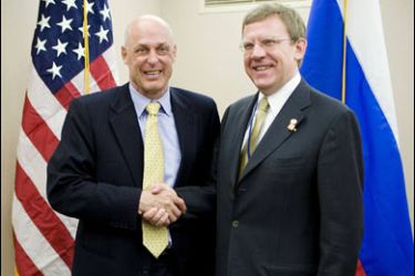 r/U.S. Secretary of the Treasury Henry Paulson (L) greets Russian Finance Minister Alexei Kudrin during the annual World Bank/IMF meeting in Washington October 20, 2007.