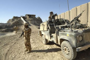 A British Army Gurkha patrol prepares to move out from a forward operating base (FOB) in Southern Helmand province, Afghanistan,