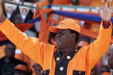 Presidential candidate Raila Odinga of the Orange Democratic Movement (ODM) greets his supporters at a rally in Nairobi December 24, 2007. Buoyed by thousands
