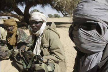 r/United Resistance Front (UDF) soldiers attend a meeting between the movement's leadership and African Union (AU) and United Nations officials (unseen) at an undisclosed location in Sudan's North Darfur province January 16, 2008.