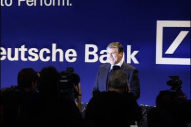r/Josef Ackermann, CEO of Germany's largest business bank, Deutsche Bank AG, smiles as he arrives for the annual news conference in Frankfurt, February 7, 2008.