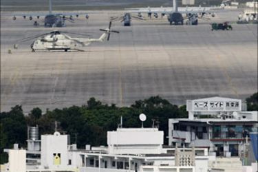 r_U.S. Marine's Futenma air station is seen between the urban area in Ginowan, southern Japanese island of Okinawa, March 6, 2008. Once an independent kingdom
