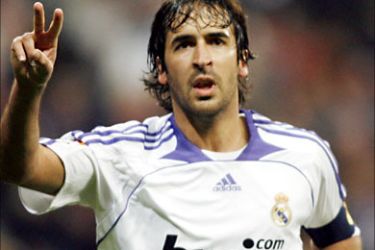 f_Real Madrid's Raul Gonzalez celebrates after scoring against Espanyol during a Spanish league football match at the Santiago Bernabeu Stadium on