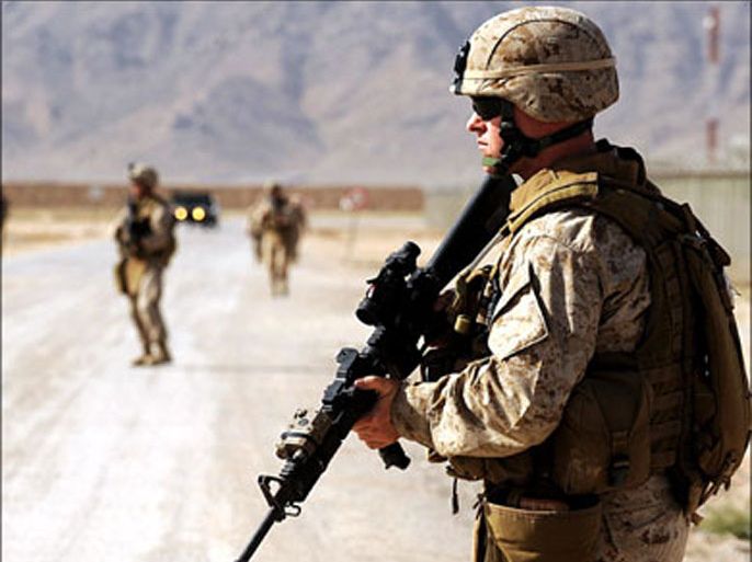 afp : US marines walk during a patrol in around their base in Kandahar province on March 24, 2008. Some 2,500 of the US Marines will start to operate with the NATO-led
