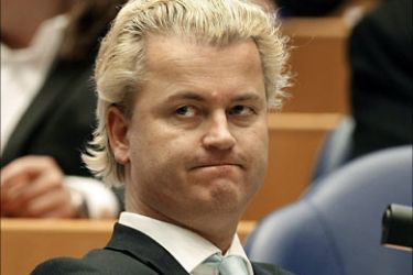f_picture taken on March 4, 2008 shows Dutch politician Geert Wilders of the Party for Freedom (PVV) sitting in the Dutch Parliament, on a day the government