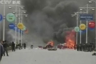 REUTERS/Fire and smoke are seen along a street during a riot in Lhasa, Tibet, in this frame grab from China's state television CCTV March