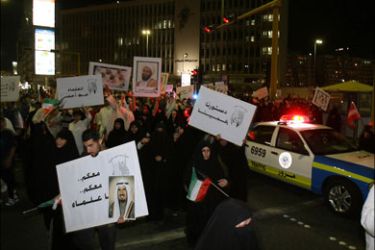 afp - Kuwaiti Shiites protest against the arrest of prominent cleric Sheikh Hussein al-Maatuq outside the interior ministry in Kuwait City on March 10, 2008. Hundreds of angry Shiites