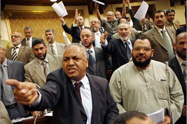 REUTERS /Independent and opposition members of the Egyptian parliament shout angrily during a session in Cairo May 5, 2008. The ruling party in Egypt on Monday proposed on