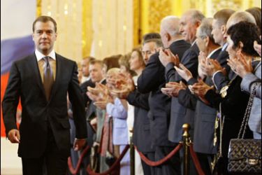 r/Dmitry Medvedev enters the hall for the inauguration ceremony in Kremlin throne room in Moscow May 7, 2008.