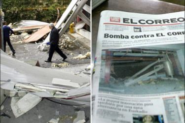 afp : Three people walk in the wreckage, on June 8, 2008, out the building of Basque newpaper El Correo, in the northern Spanish Basque village of Zamudio, near Bilbao. An