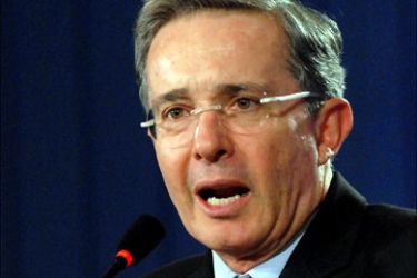 afp : Colombian President Alvaro Uribe speaks on his economic program June 26, 2008 in Bogota. Uribe asked Congress to immediately schedule an early presidential vote