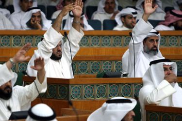 AFP/ Kuwaiti members of parliament attend a seesion of the national assembly in Kuwait City on June 24, 2008. Kuwaiti lawmakers today unanimously approved a recommendation calling to launch a probe into allegations of mispropriation of funds by the office of the prime minister.