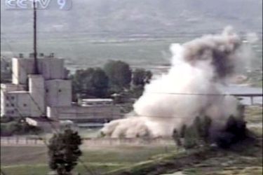afp : This TV footage from the National Chinese Television channel shows the public demolition of North Korea's cooling tower at its Yongbyon nuclear complex on June 27, 2008.
