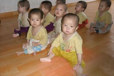 This handout photo released on July 30, 2008 from the World Food Programme (WFP) shows malnourished children sitting on the floor of an orphanage in Chongjin City,