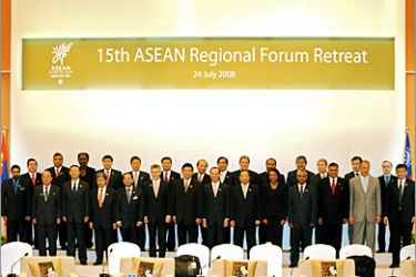 AFP / Top officials from the 27-nation Association of Southeast Asian Nations (ASEAN) Regional Forum pose for a group photograph -- before the opening of Asia's top security meeting in Singapore on July 24, 2008. Aside from the 10-