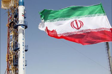 r_The Safir (ambassador) satellite-carrier rocket, which will carry Iran's Omid (hope) satellite, is seen before launch at Iran's space centre in Tehran August 17, 2008