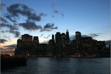 /AFP - Lower Manhattan and the Financial District are seen from Brooklyn at sunset September 19, 2008 in the Brooklyn borough of New York City. Wall Street ended a tumultuous