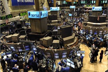 AFPTraders on the floor of the New York Stock Exchange October 6, 2008. Wall Street tumbled after the opening bell as fallout from the credit crisis triggered concerns about the economy and the Dow