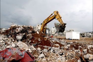 afp : An excavator removes rubble from the destroyed old part of the Palestinian refugee camp of Nahr al-Bared in northern Lebanon on October 29, 2008. United Nations