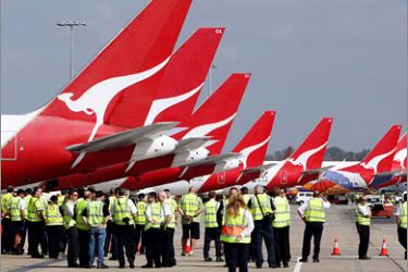 AFP This picture taken on September 21, 2008 shows Qantas aircraft lining the apron at Sydney Airport amid growing speculation that the airline