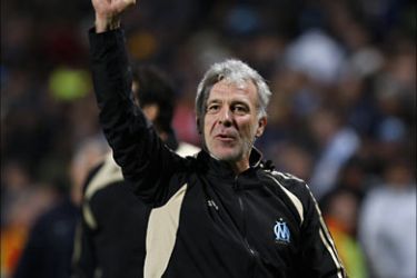 r_Olympique Marseille's coach Eric Gerets celebrates after their Champions League soccer match against PSV Eindhoven at the Velodrome stadium in Marseille, November