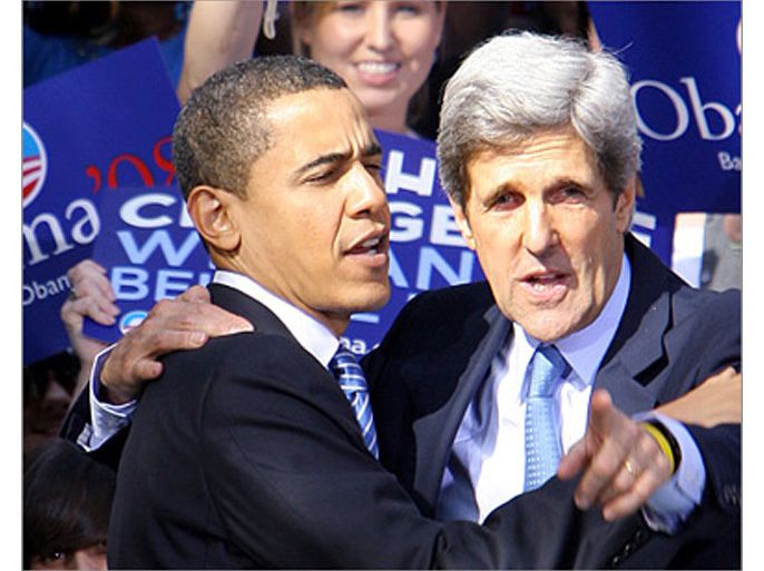 AFP(FILES) Dated January 10, 2008 file photo shows then US Democratic presidential hopeful Barack Obama (L) is greeted by former presidential candidate Senator John Kerry